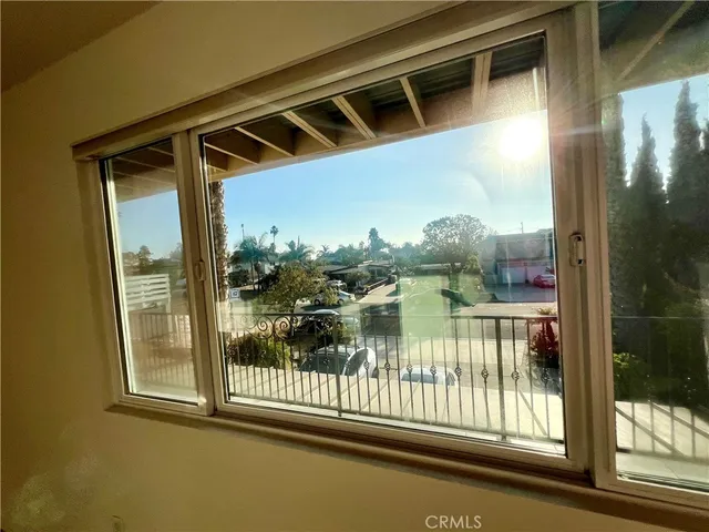 a kitchen with stainless steel appliances granite countertop a stove a refrigerator and a microwave