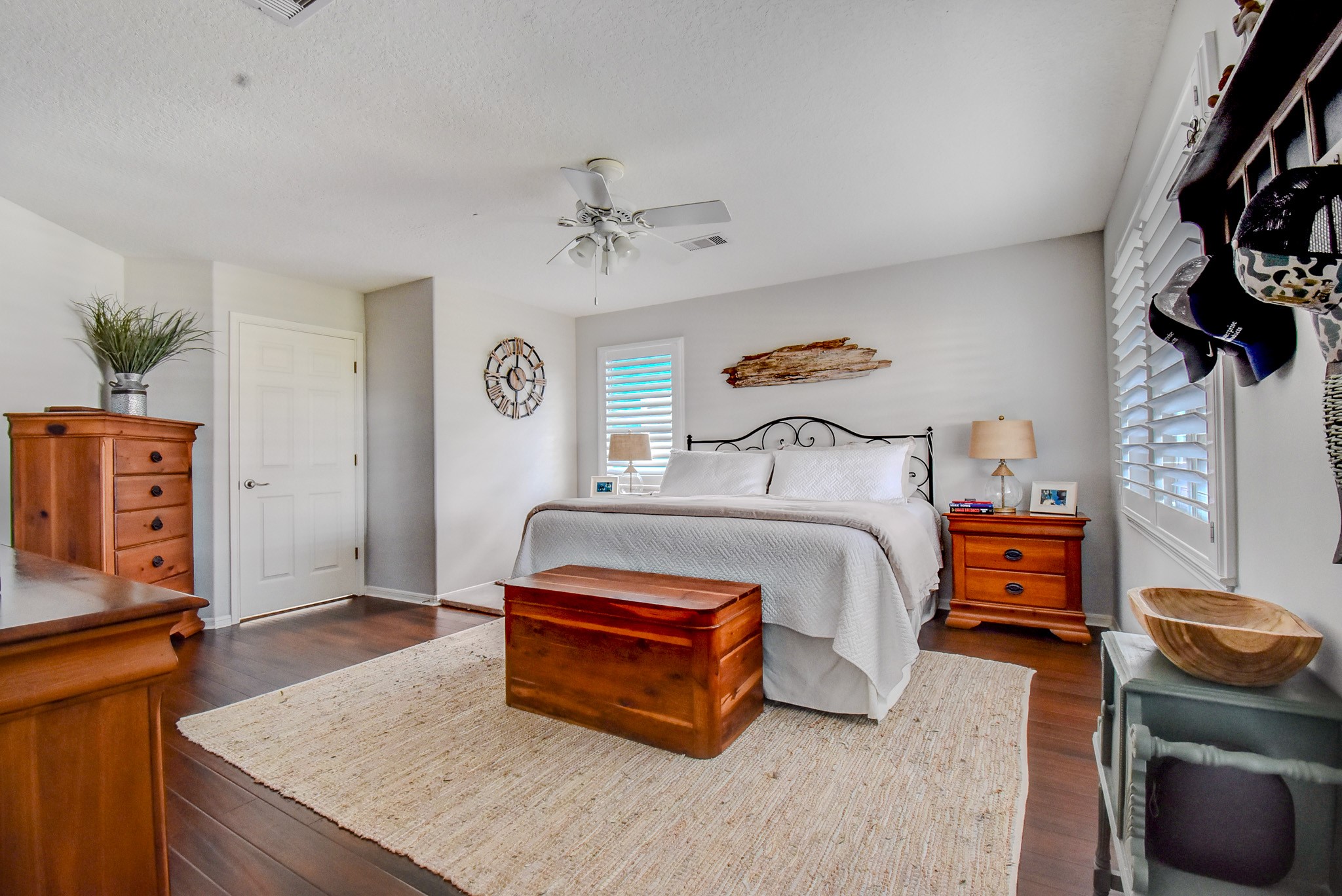 122 Four Master Road Freeport, TX 77541 - Photo 24 of 50 a bedroom with furniture and wooden floor