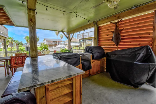 a view of a porch with furniture