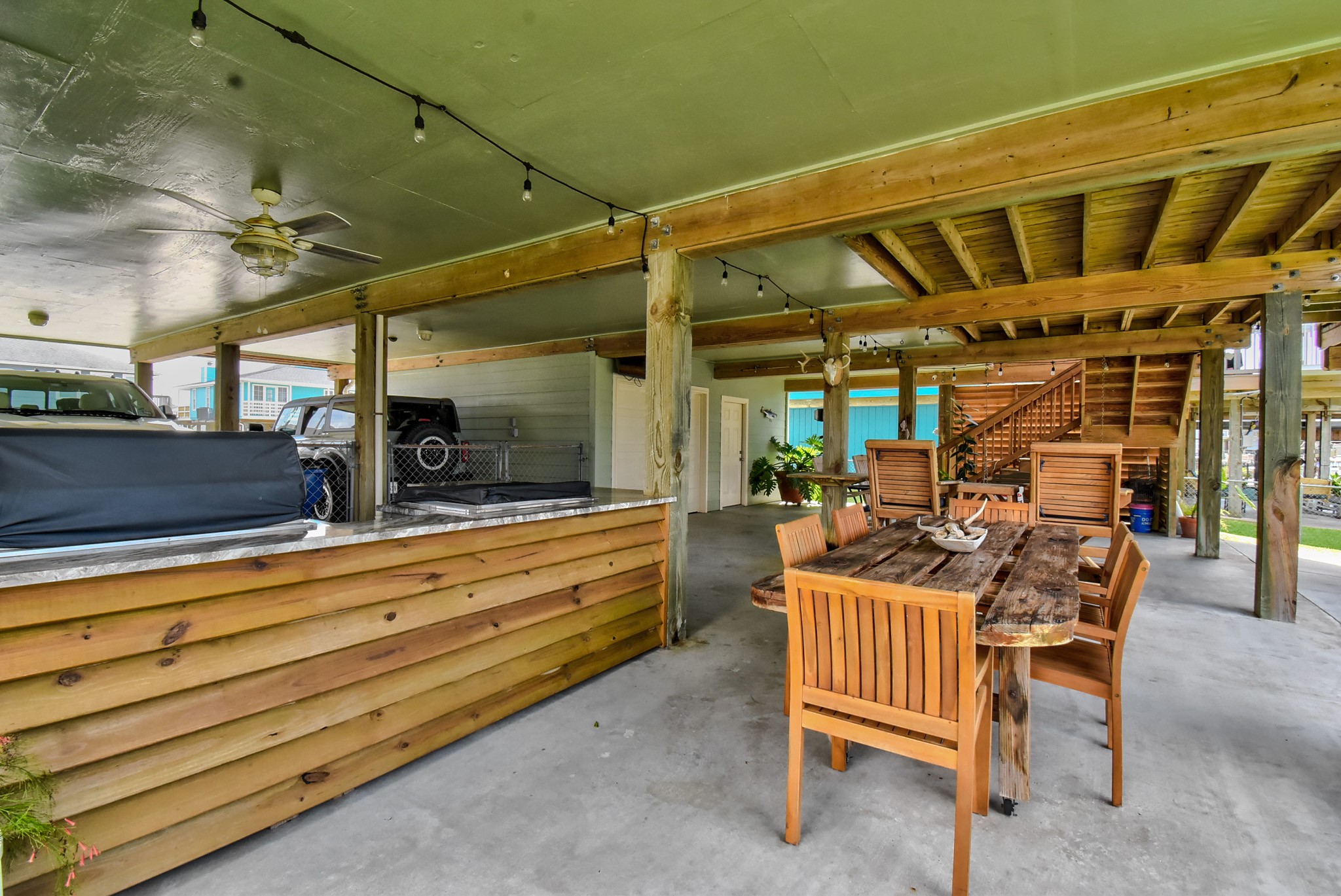 122 Four Master Road Freeport, TX 77541 - Photo 43 of 50 a view of a chairs and table in a patio