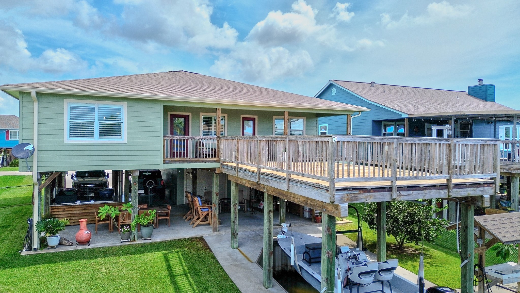 122 Four Master Road Freeport, TX 77541 - Photo 5 of 50 a view of a house with a yard and furniture