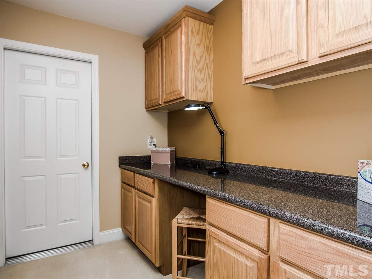 11636 Broadfield Court Raleigh, NC 27617 - Photo 15 of 25 This is such a great space for a hobby room or an office.