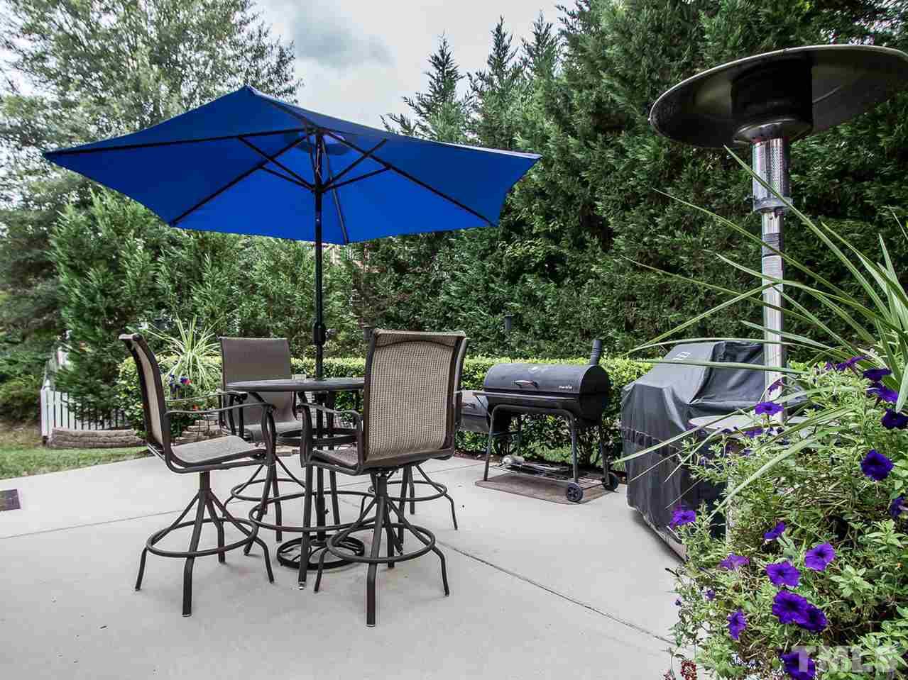 11636 Broadfield Court Raleigh, NC 27617 - Photo 19 of 25 Custom concrete patio is a great entertaining spot.