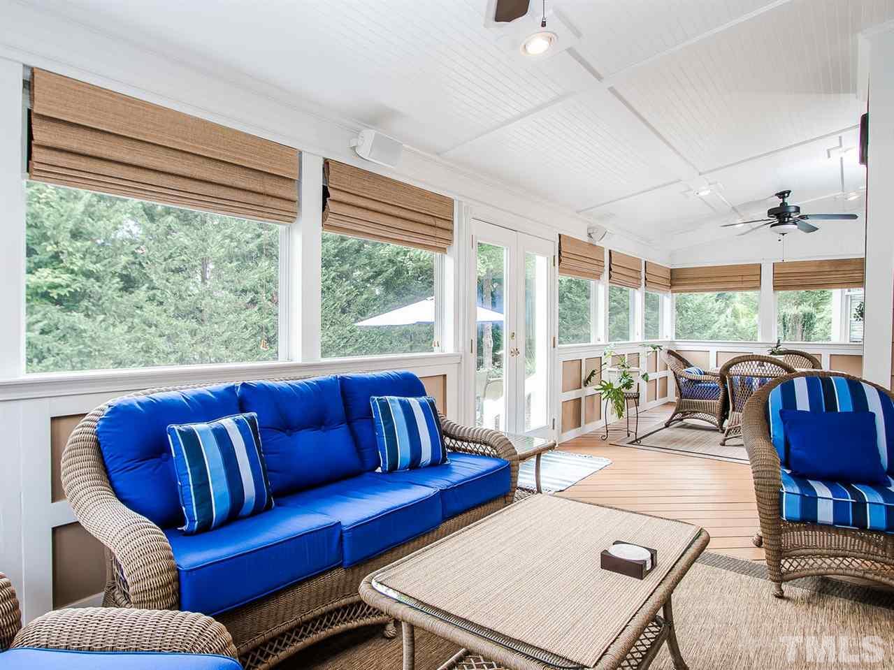 11636 Broadfield Court Raleigh, NC 27617 - Photo 20 of 25 4 season porch is huge! It offers Eze-Breeze windows, french doors, 2 fans, sound system, cable outlets, recessed lighting and bamboo shades. So perfect!