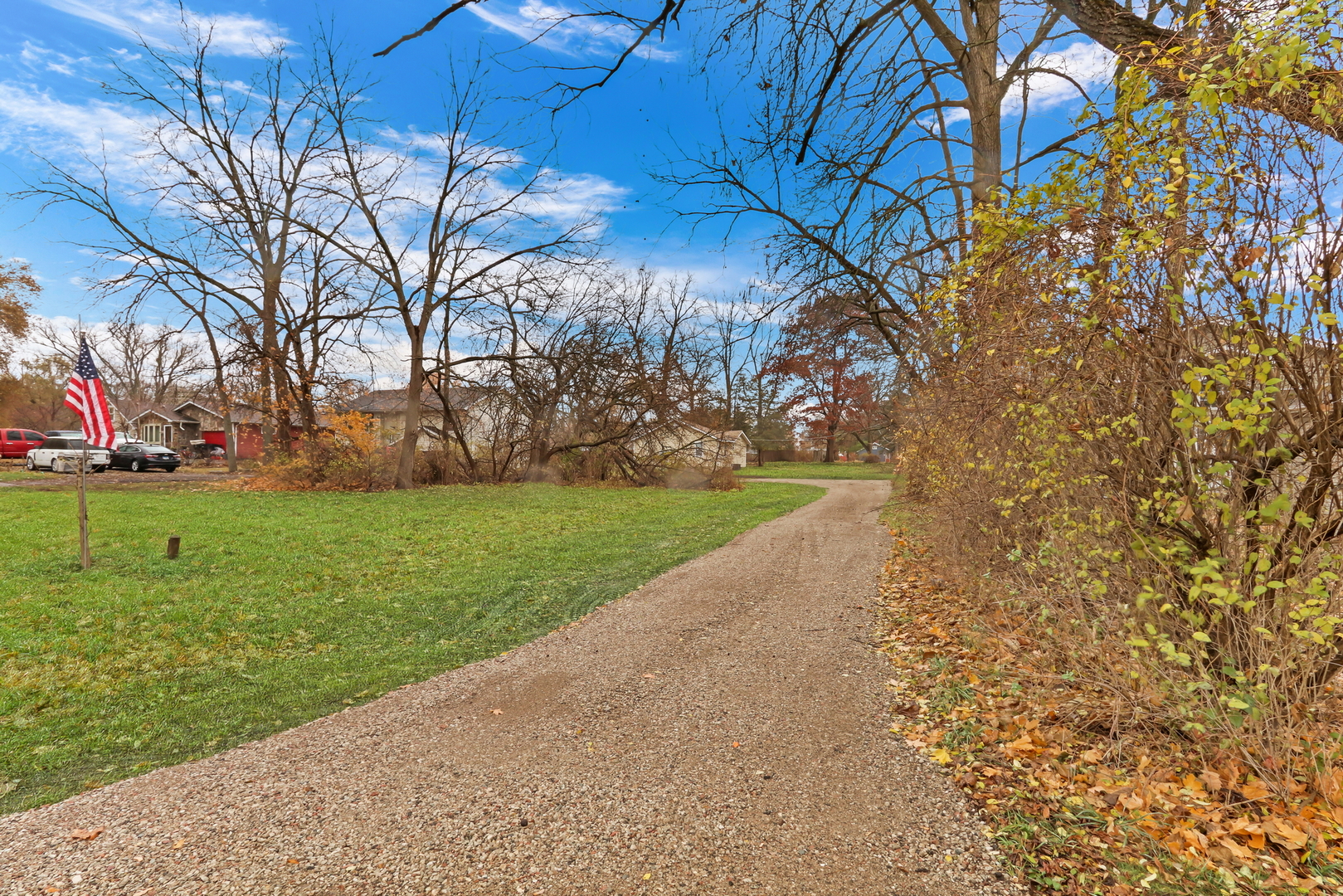 24791 West Rollins Road Round Lake, IL 60073 - Photo 19 of 26 a view of a yard with yellow house