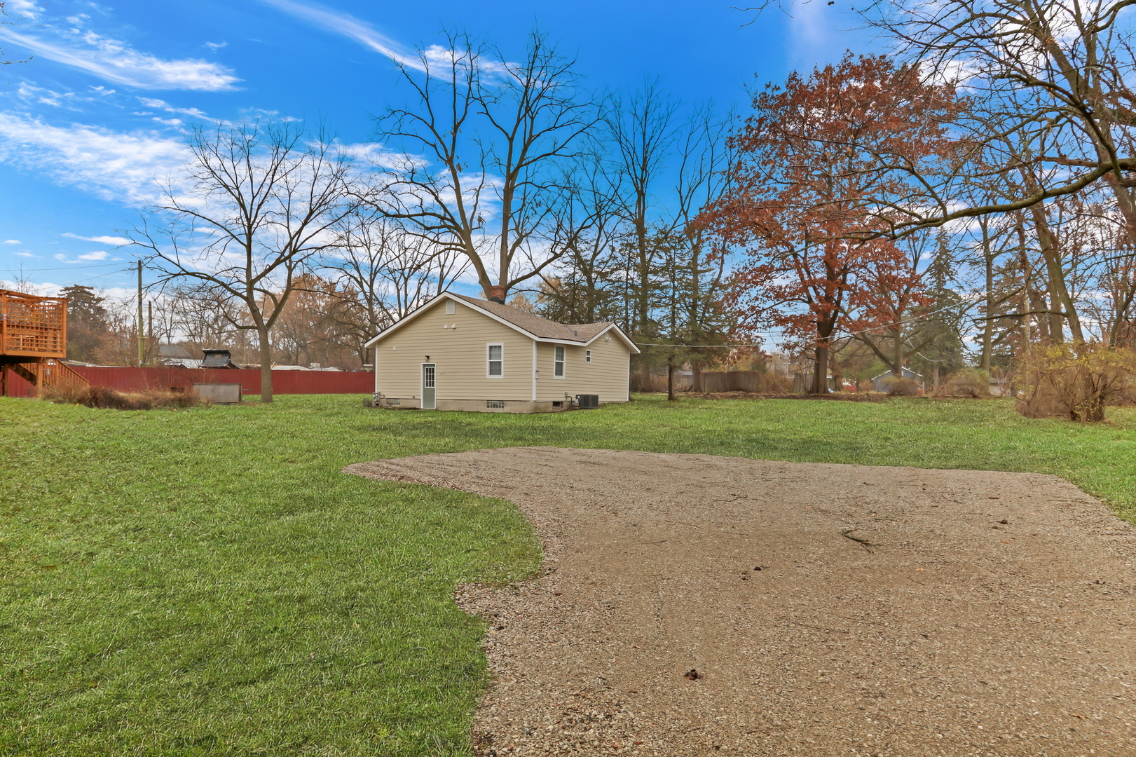 24791 West Rollins Road Round Lake, IL 60073 - Photo 24 of 26 a view of a house with yard and tree s
