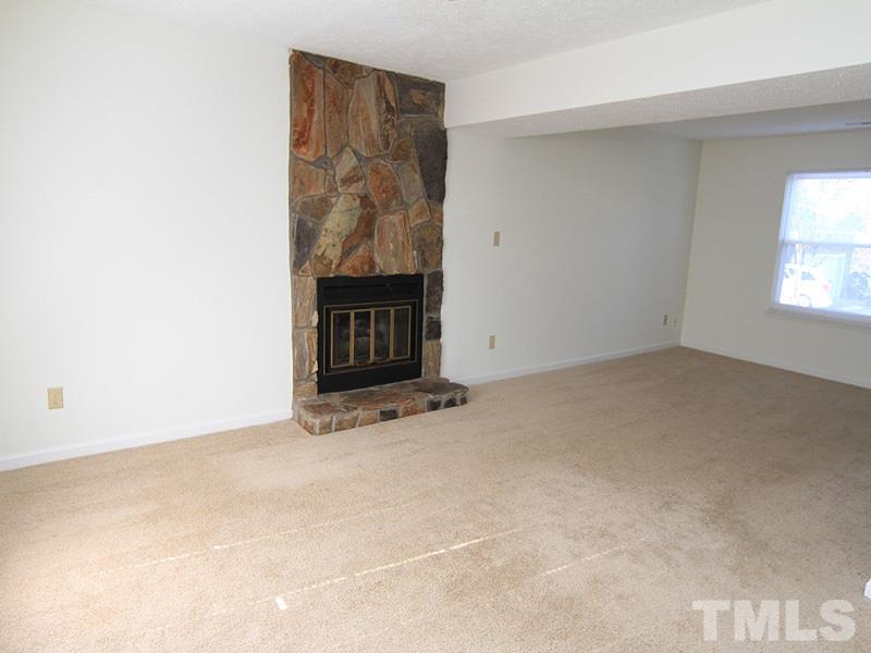 4605 Goldsmith Court Raleigh, NC 27613 - Photo 7 of 20 an empty room with windows