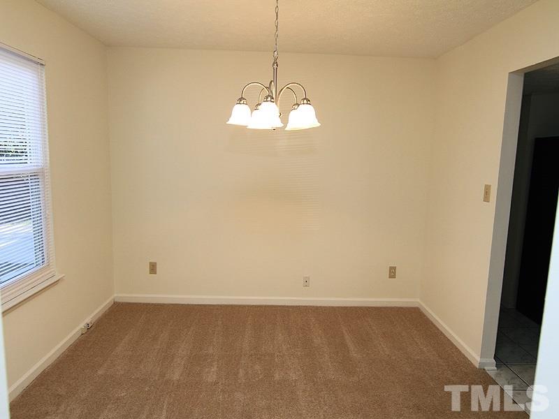4605 Goldsmith Court Raleigh, NC 27613 - Photo 9 of 20 en empty room with window
