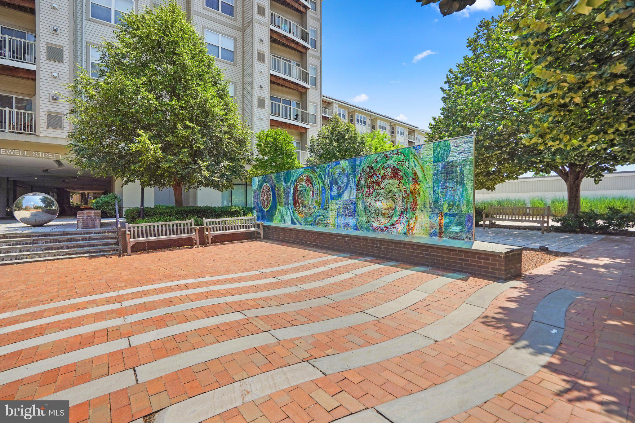 8045 Newell Street, Unit 102 Silver Spring, MD 20910 - Photo 25 of 31 Gorgeous Glass art installation in front courtyard