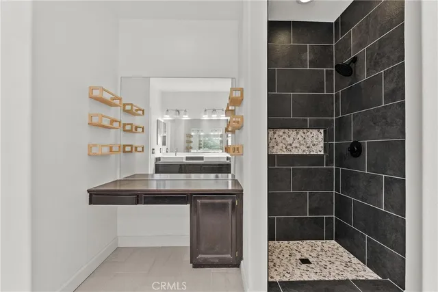 a picture of a bathroom with a sink and a mirror