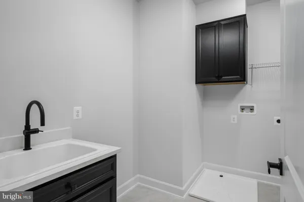 a close up of a sink and a vanity