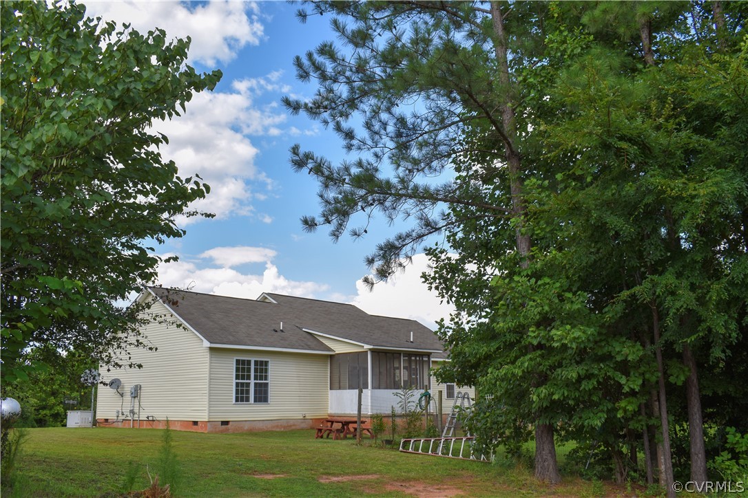 9925 Scotts Road Dewitt, VA 23840 - Photo 21 of 31 View of the back of the home and covered porch.