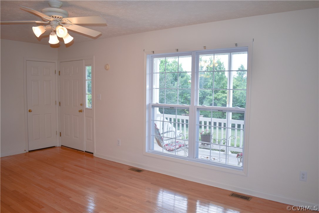 9925 Scotts Road Dewitt, VA 23840 - Photo 4 of 31 Living room has beautiful hardwood floors and new