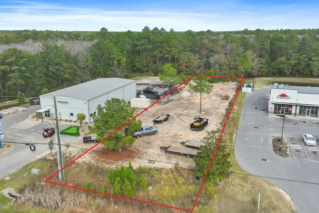 swimming pool view with a lake view