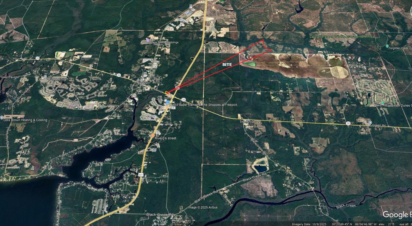 779 Highway 20 Freeport, FL 32439 - Photo 9 of 10 a backyard of a house with lots of green space