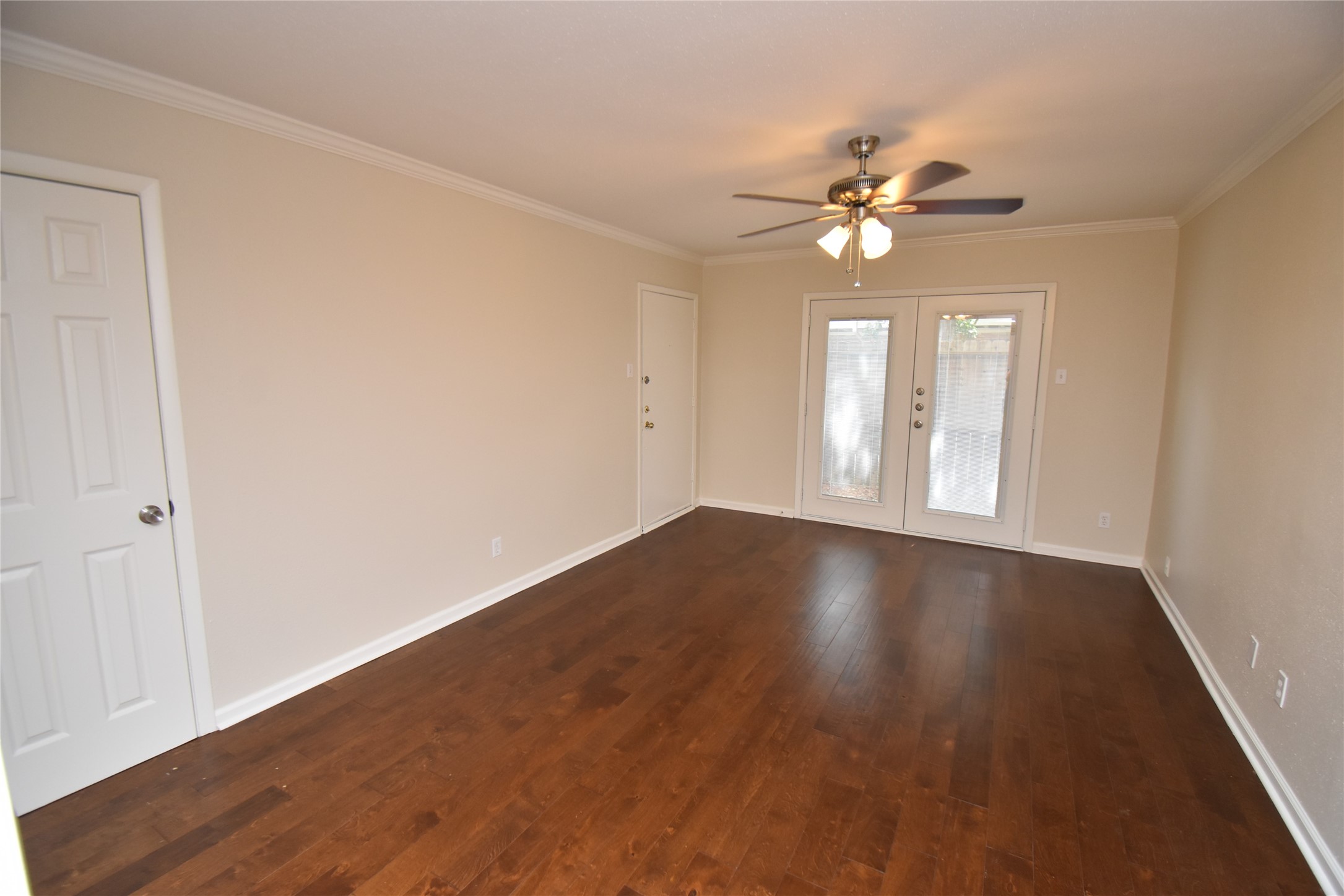 4040 San Felipe Street, Unit 155 Houston, TX 77027 - Photo 8 of 15 wooden floor in an empty room with a window