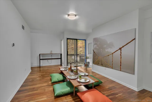 a bathroom with a sink mirror and toilet