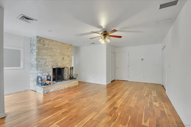 a view of a livingroom with a fireplace
