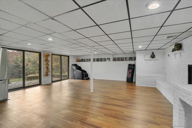 a white toilet sitting next to a bathroom sink
