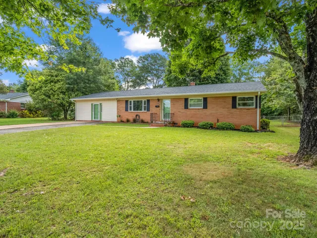 a house view with a garden space