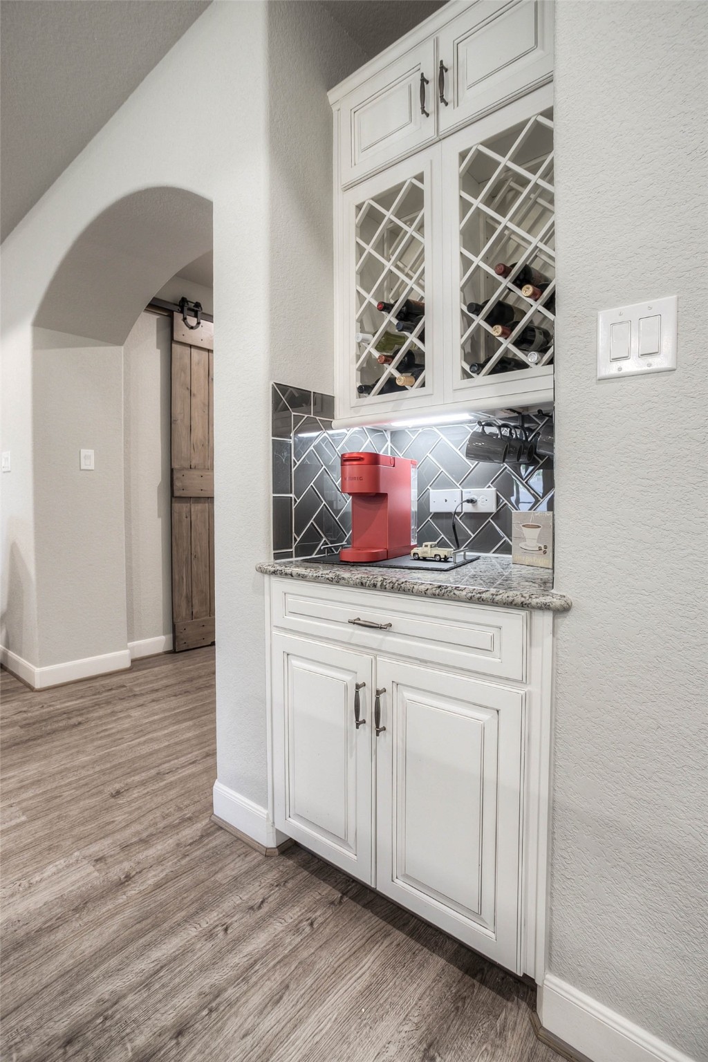5757 Lakeside Villas Court Conroe, TX 77304 - Photo 15 of 50 a kitchen with a cabinets and wooden floor