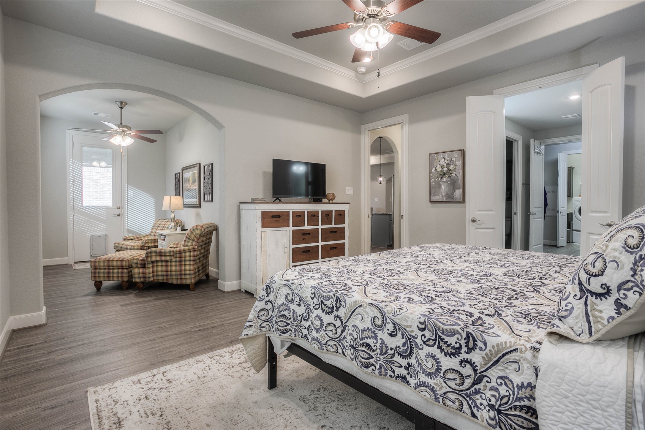 5757 Lakeside Villas Court Conroe, TX 77304 - Photo 22 of 50 a bedroom with a bed couch and a window