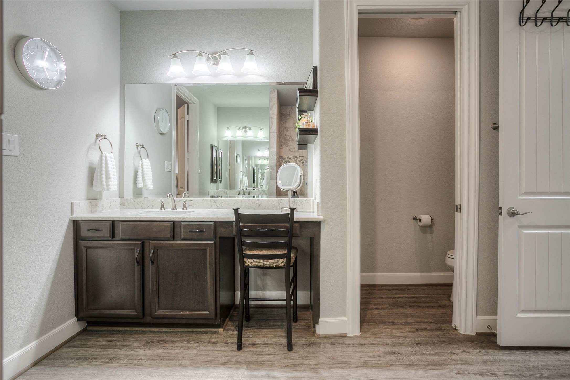 5757 Lakeside Villas Court Conroe, TX 77304 - Photo 27 of 50 a bathroom with a sink and a mirror