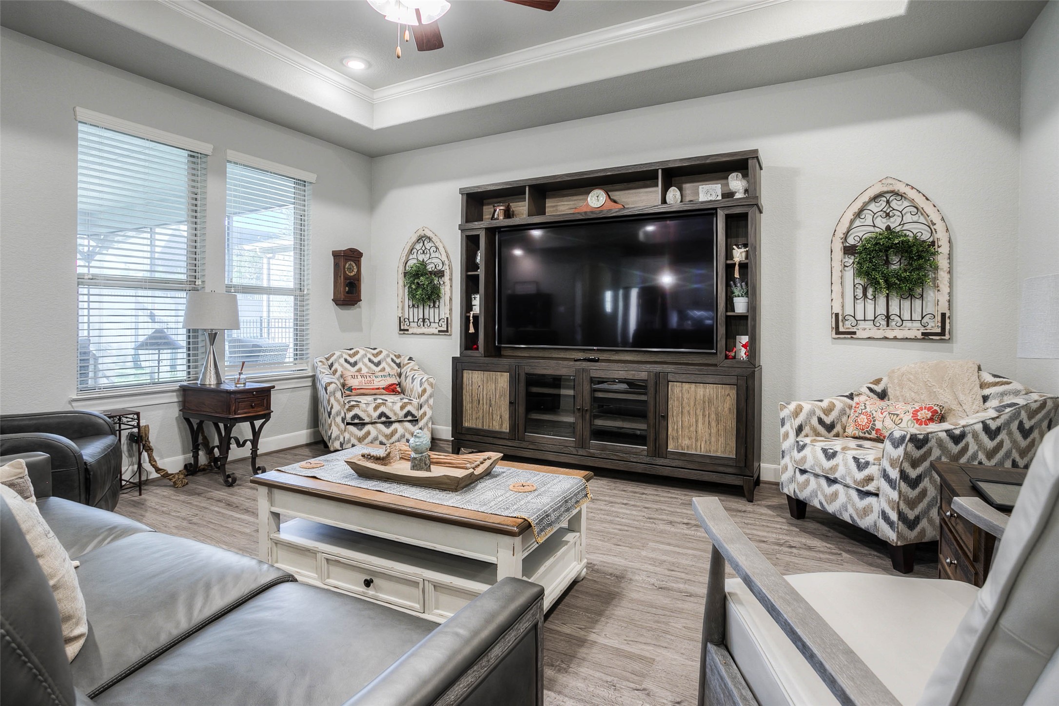 5757 Lakeside Villas Court Conroe, TX 77304 - Photo 3 of 50 a living room with furniture and a flat screen tv