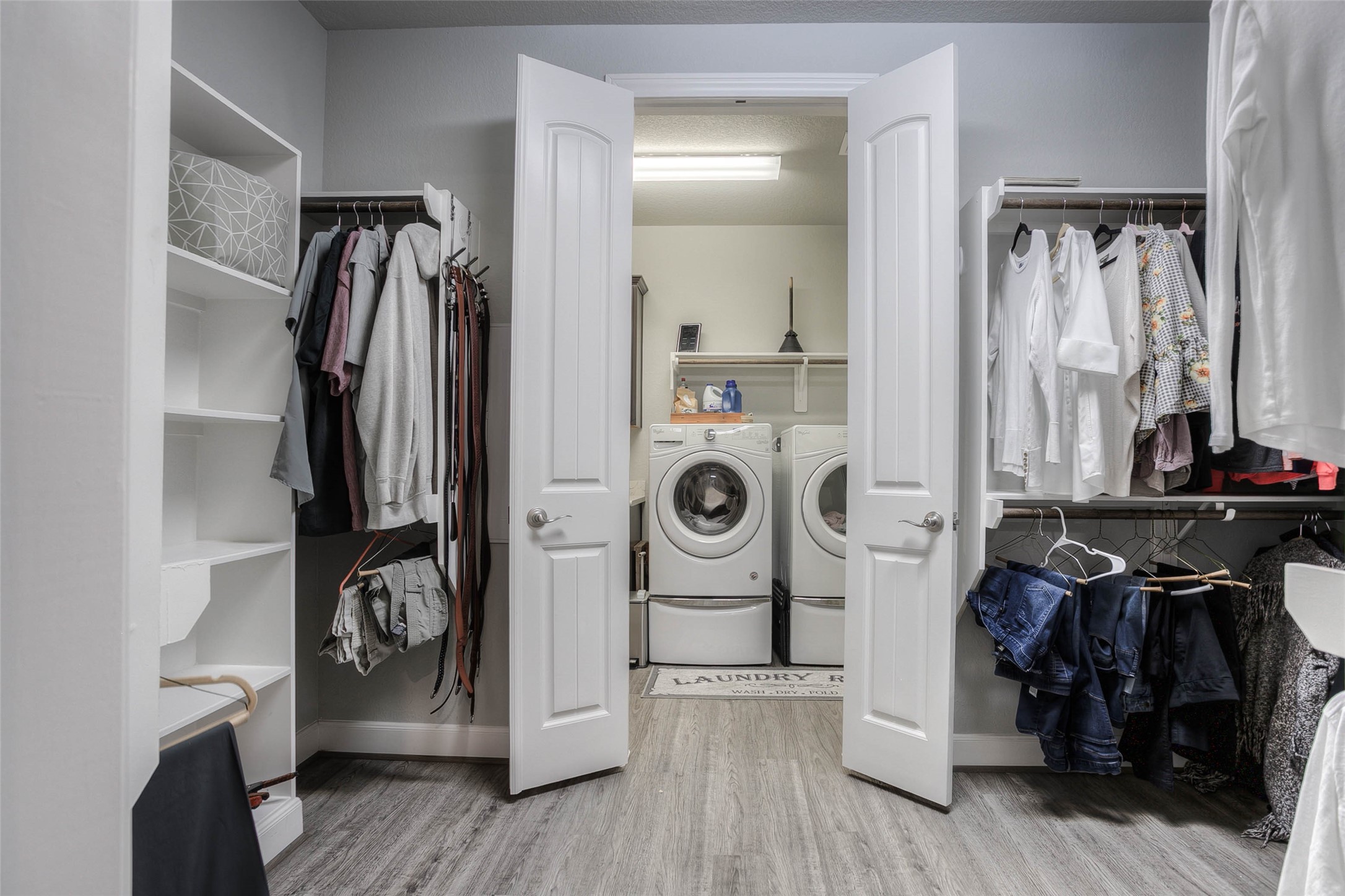 5757 Lakeside Villas Court Conroe, TX 77304 - Photo 33 of 50 a view of walk in closet with clothes and shoes