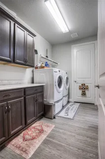 a utility room with cabinets