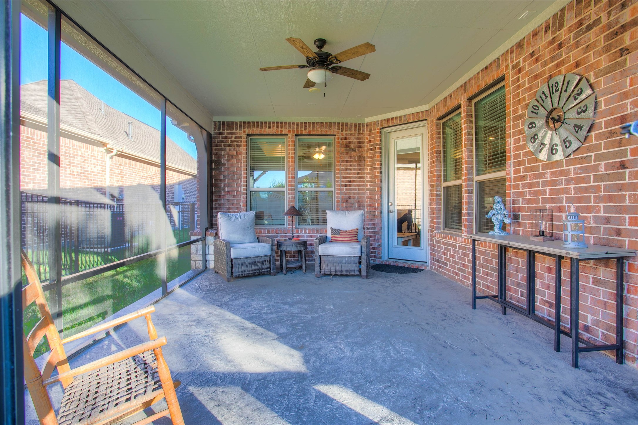 5757 Lakeside Villas Court Conroe, TX 77304 - Photo 41 of 50 a living room with furniture and a large window
