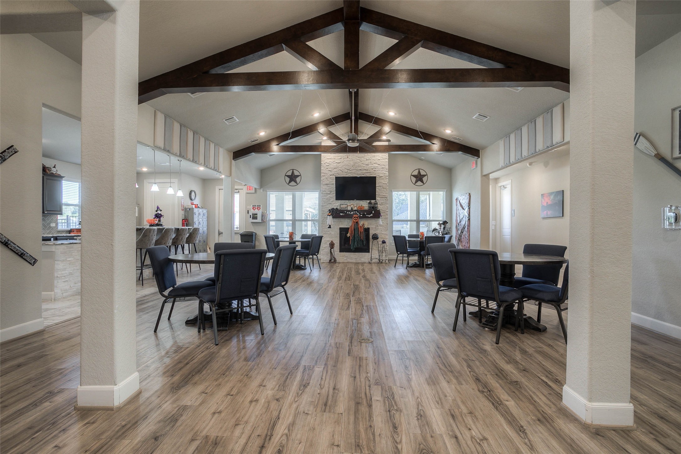 5757 Lakeside Villas Court Conroe, TX 77304 - Photo 45 of 50 a view of a dining room with furniture and wooden floor