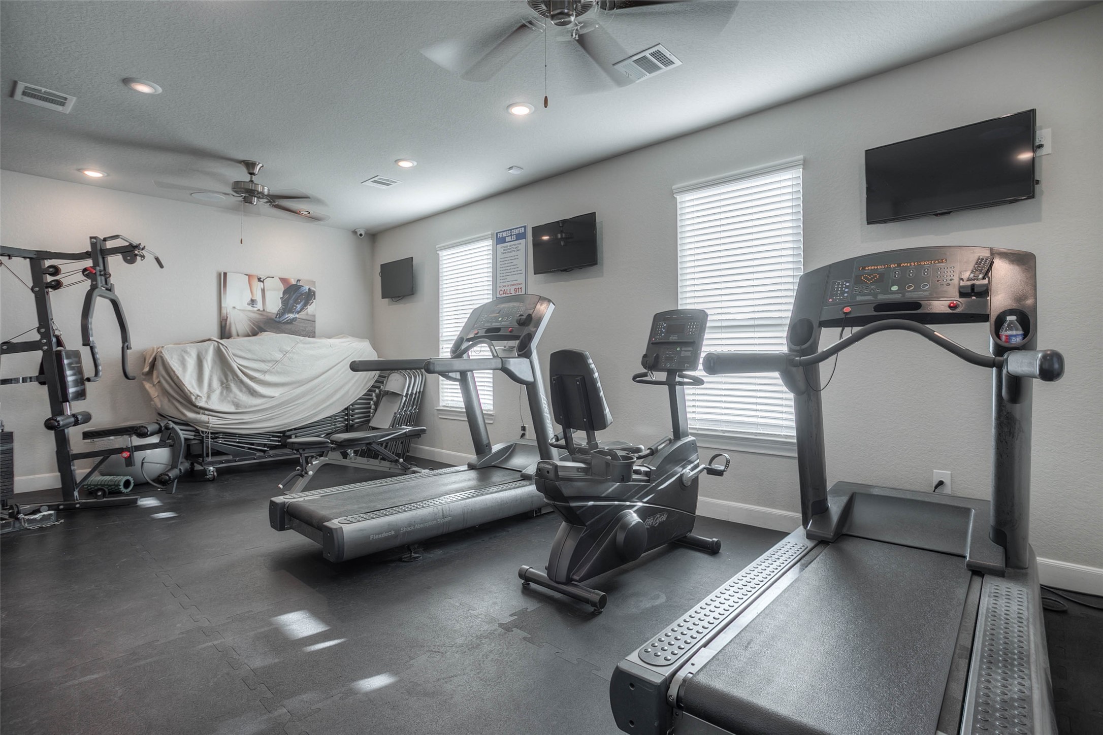 5757 Lakeside Villas Court Conroe, TX 77304 - Photo 47 of 50 a view of a room with gym equipment
