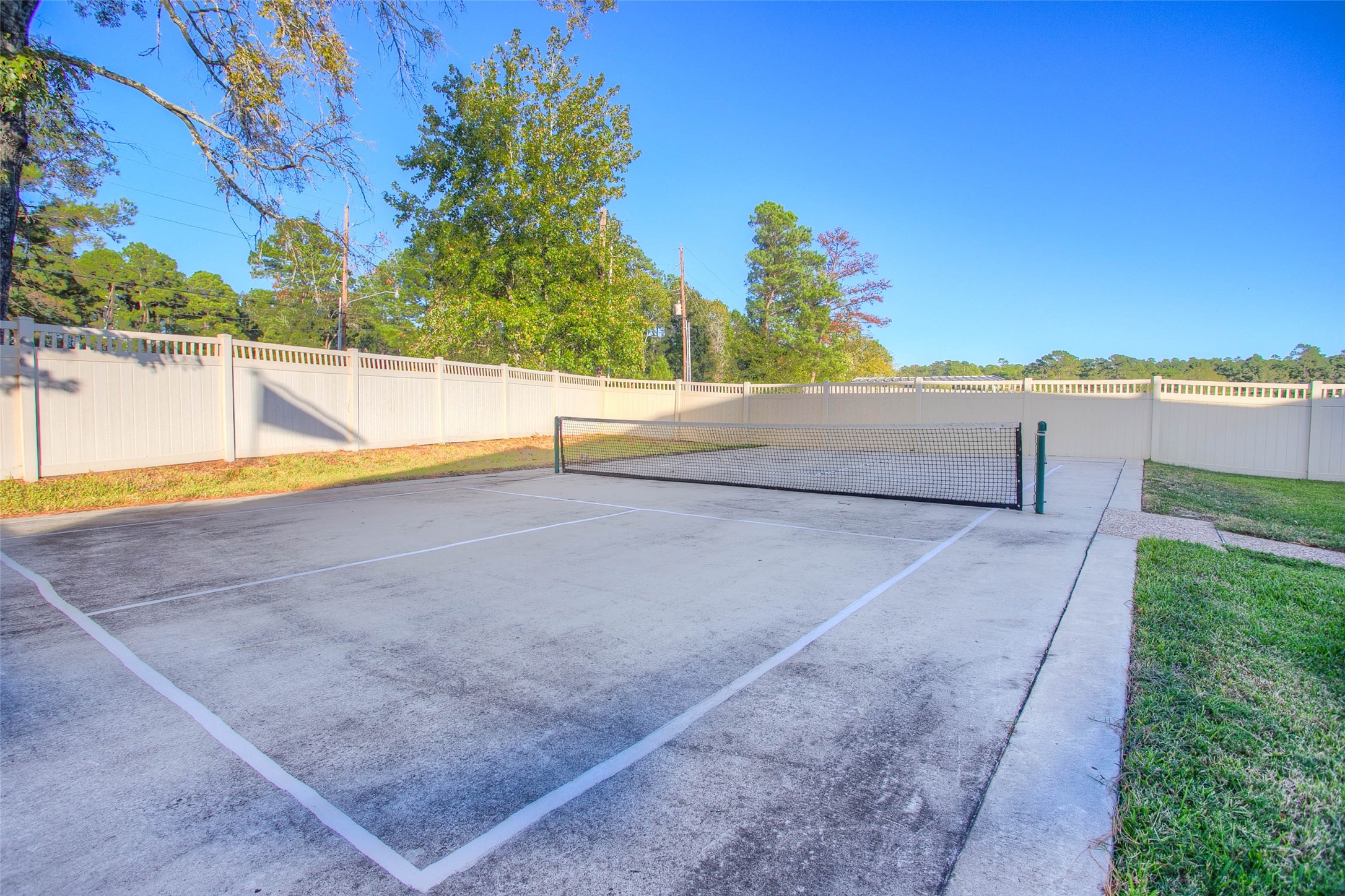5757 Lakeside Villas Court Conroe, TX 77304 - Photo 49 of 50 a view of a terrace with a lake view