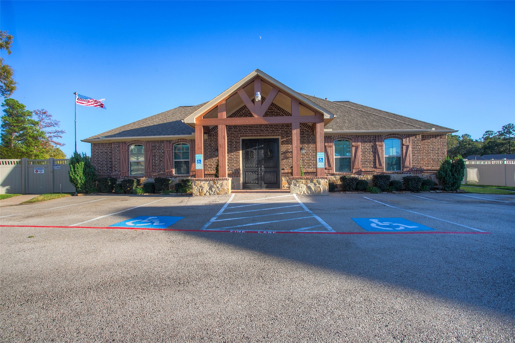 5757 Lakeside Villas Court Conroe, TX 77304 - Photo 50 of 50 a front view of a house with a yard