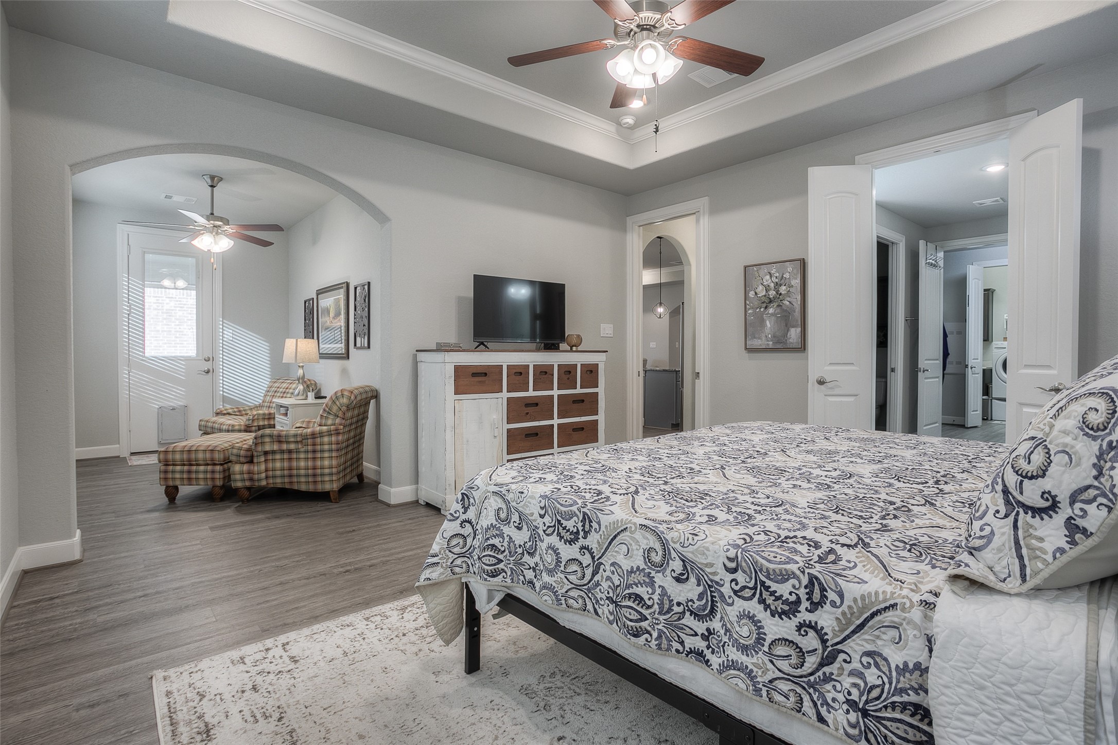 5757 Lakeside Villas Court Conroe, TX 77304 - Photo 6 of 50 a bedroom with a bed couch and a window