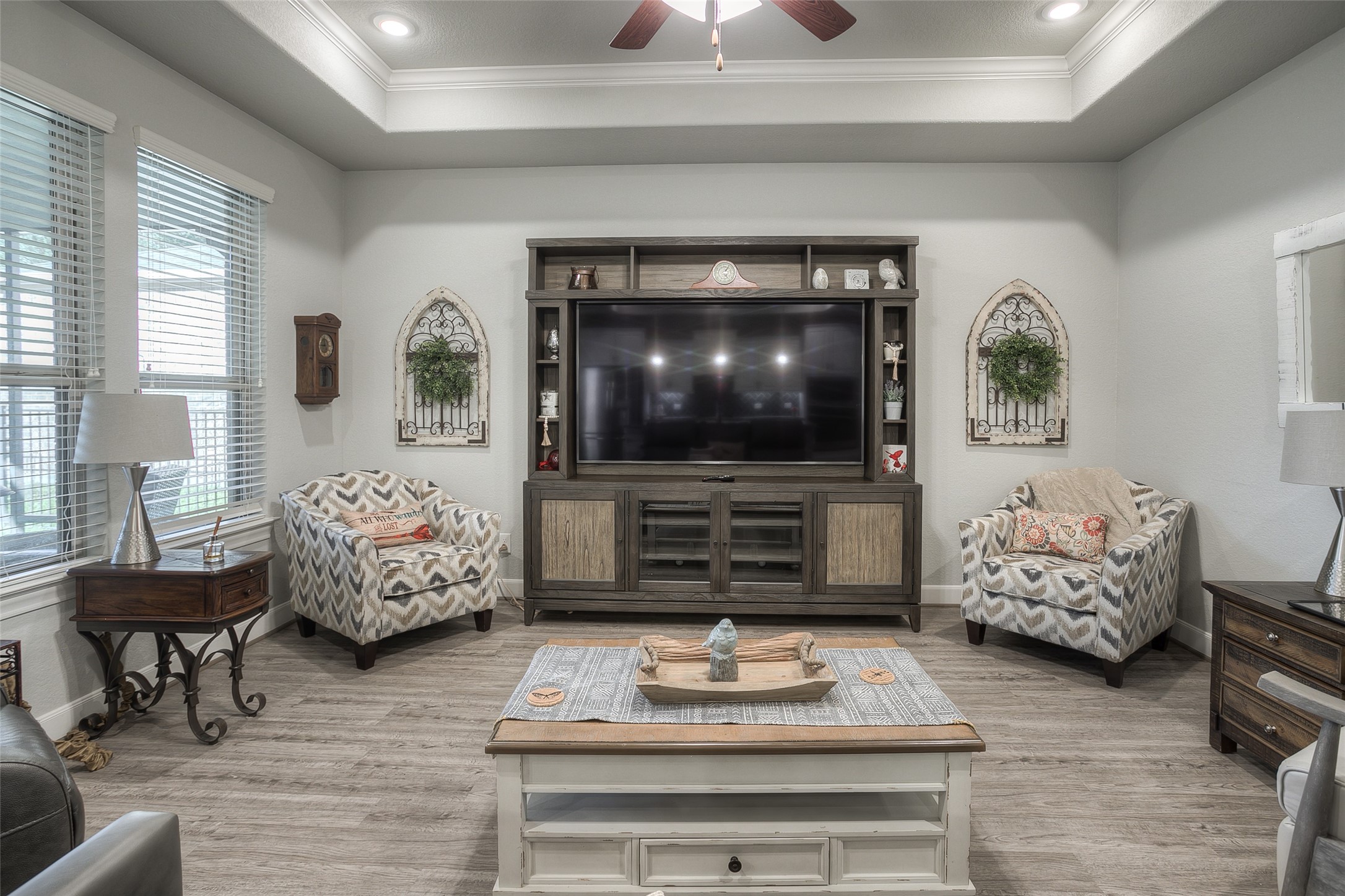 5757 Lakeside Villas Court Conroe, TX 77304 - Photo 7 of 50 a living room with furniture and a flat screen tv