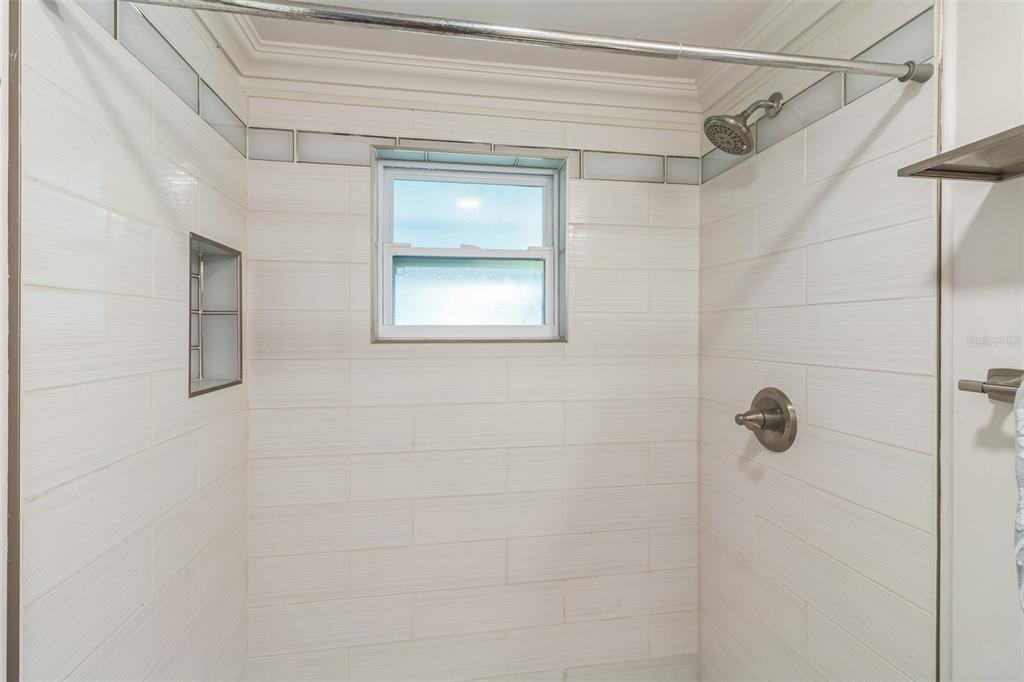 5390 South Manatee Terrace Homosassa, FL 34446 - Photo 17 of 25 a bathroom with a shower