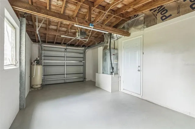 a view of a backyard with a garden and plants