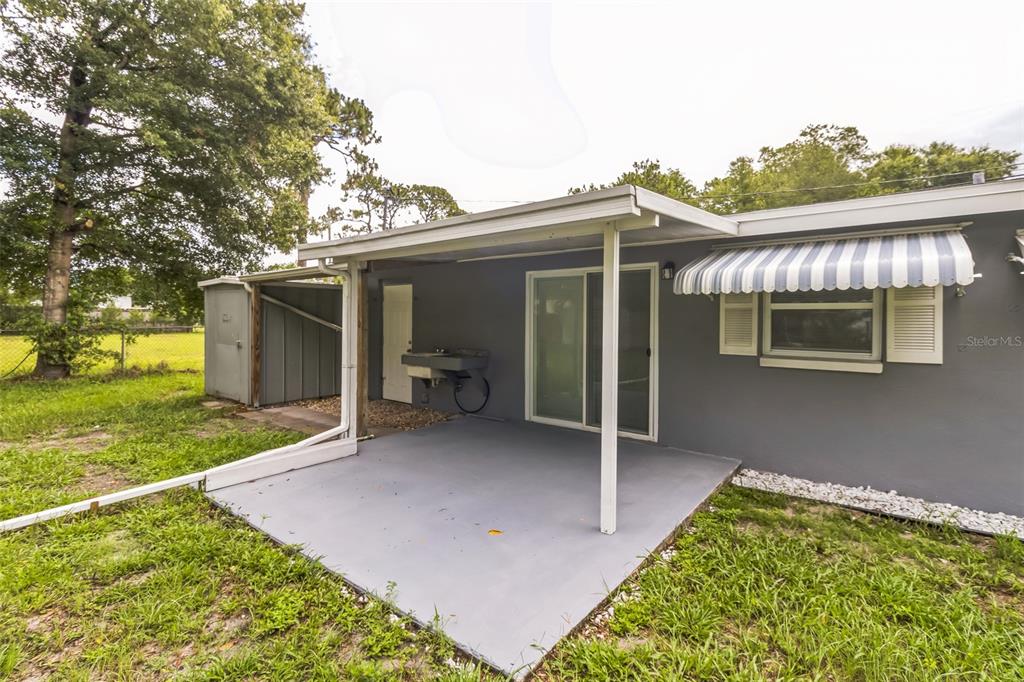 5390 South Manatee Terrace Homosassa, FL 34446 - Photo 22 of 25 a view of a backyard with a garden and plants
