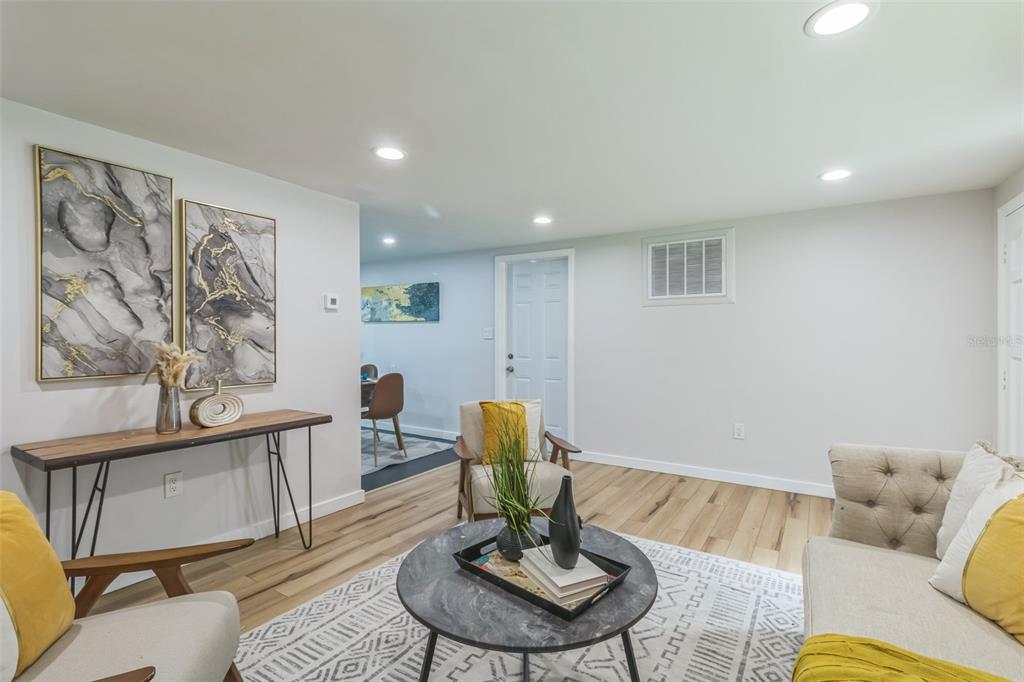 5390 South Manatee Terrace Homosassa, FL 34446 - Photo 6 of 25 a living room with furniture and a dining table