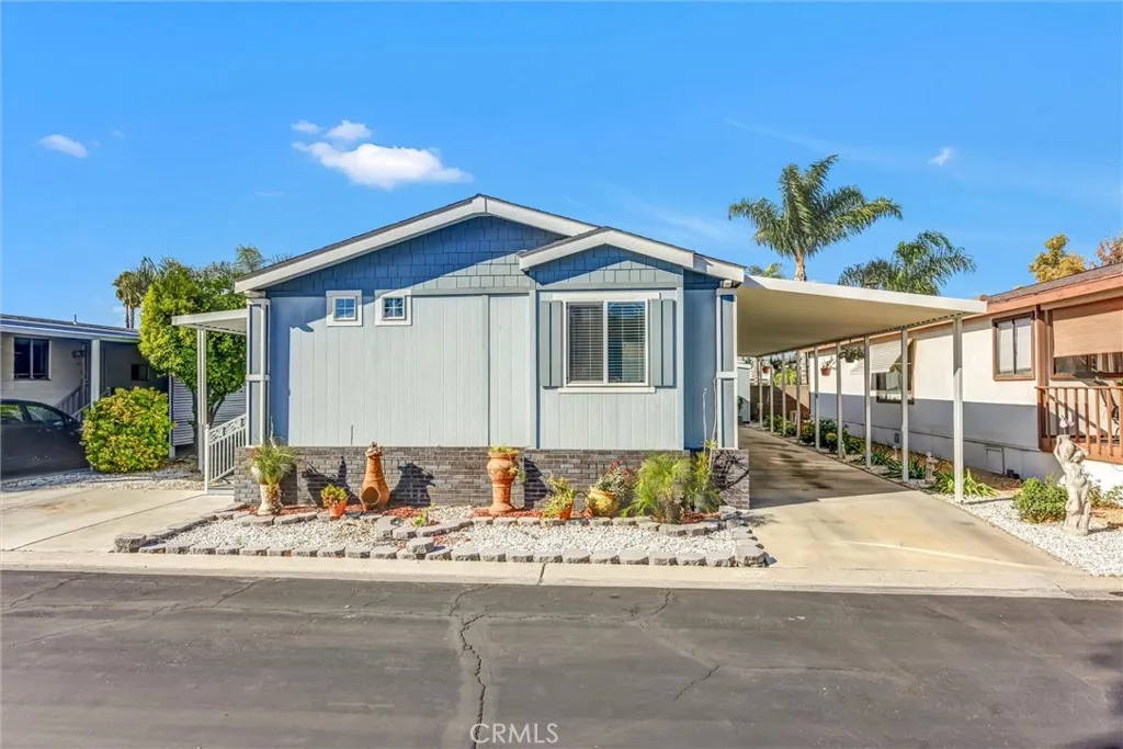 4000 Pierce Street, Unit 207 Riverside, CA 92505 - Photo 1 of 1 a front view of a house with a yard