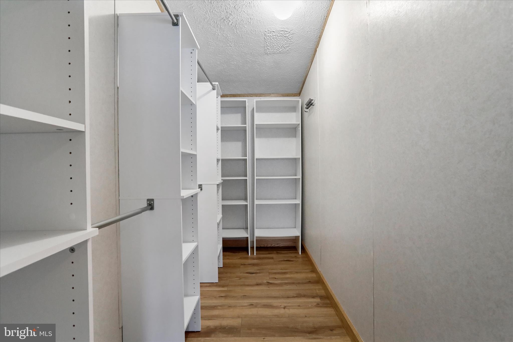 3688 Ash Ruckman Road Augusta, WV 26704 - Photo 23 of 66 a view of a hallway with wooden floor and entryway