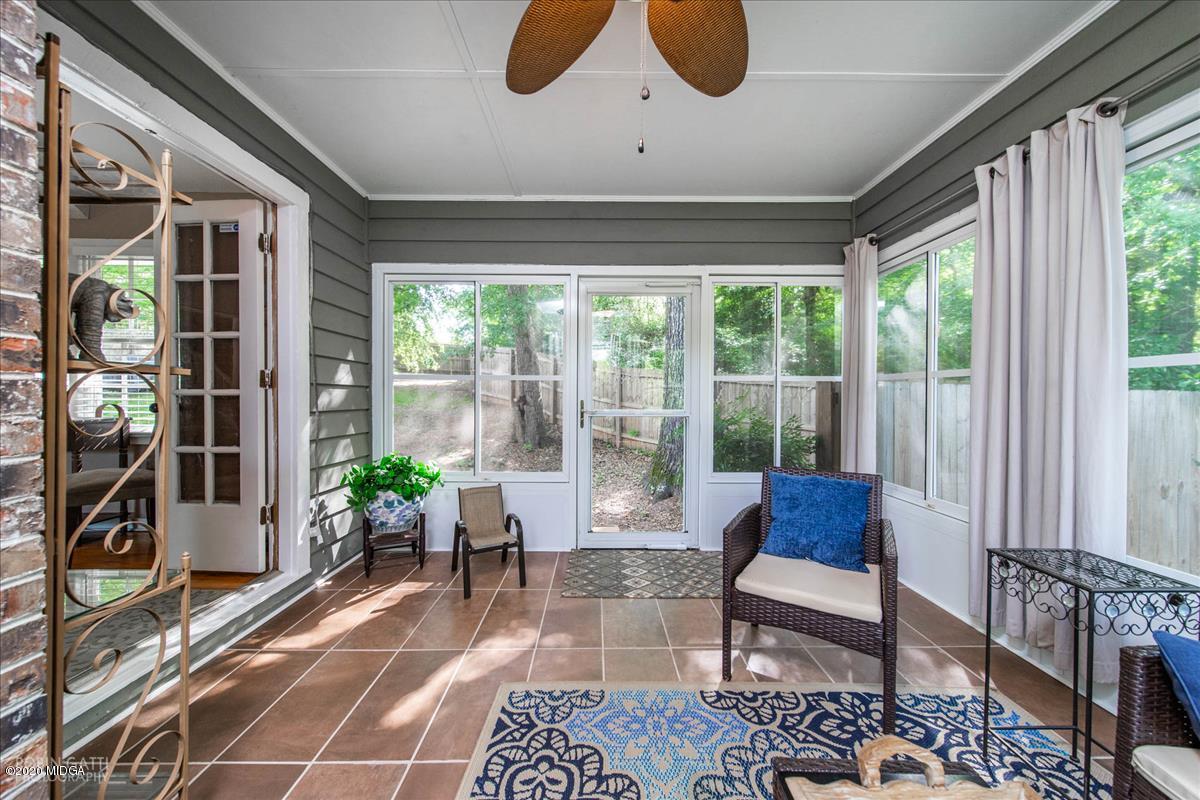 6431 Stapleton Road Macon, GA 31206 - Photo 14 of 29 a living room filled with furniture and a potted plant