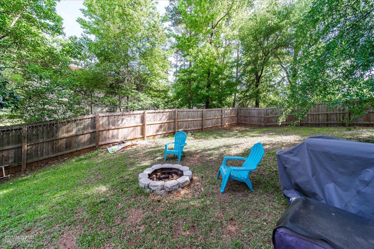 6431 Stapleton Road Macon, GA 31206 - Photo 23 of 29 a backyard of a house with garden and outdoor seating