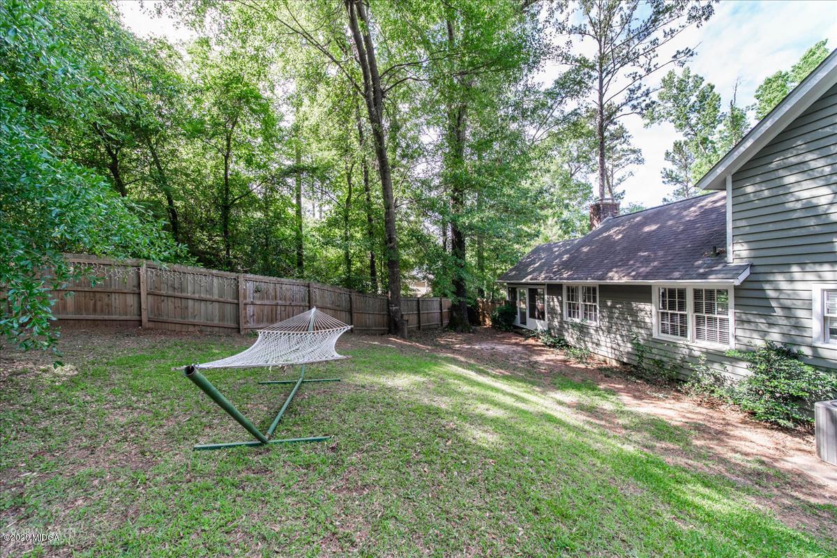 6431 Stapleton Road Macon, GA 31206 - Photo 24 of 29 a view of a house with a backyard