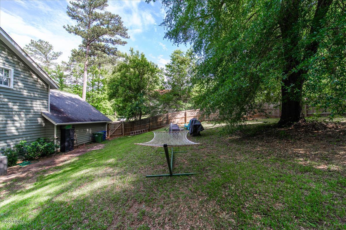 6431 Stapleton Road Macon, GA 31206 - Photo 25 of 29 a backyard of a house with table and chairs