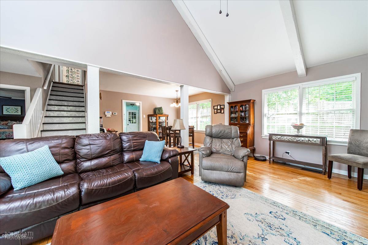 6431 Stapleton Road Macon, GA 31206 - Photo 6 of 29 a living room with furniture and a large window