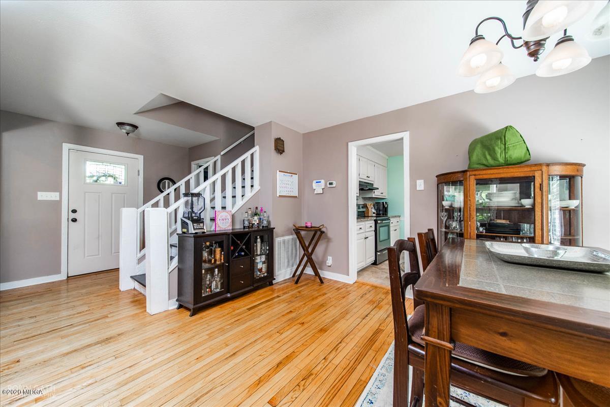 6431 Stapleton Road Macon, GA 31206 - Photo 8 of 29 a view of a dining room with furniture and wooden floor