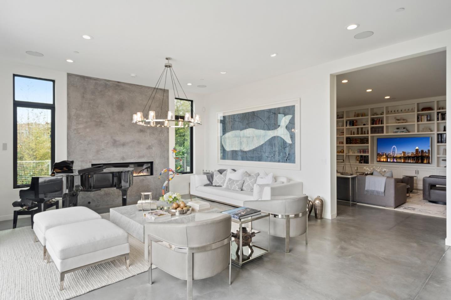 21 Gilmartin Drive Tiburon, CA 94920 - Photo 20 of 82 a living room with furniture and a flat screen tv